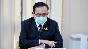 លោកប្រាយុទ្ធអះអាងថា ផលប៉ះពាល់នៃមេរោគកូវីដ-១៩ អាចនឹងបន្តដល់រយៈពេល៩ខែទៀត (រូបភាព៖AFP PHOTO / ROYAL THAI GOVERNMENT)